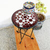 Vibrant mosaic table showcasing traditional Moroccan craftsmanship, ideal for coffee or accent use in various settings.