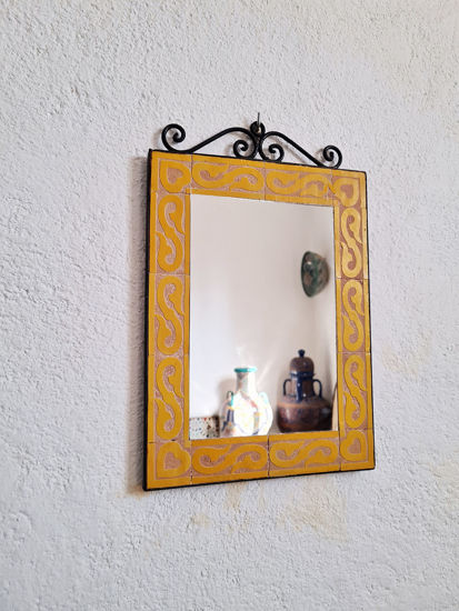 Handmade yellow mosaic wall mirror, showcasing intricate zellige tilework and Moroccan design charm.