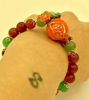 Picture of Pomegranates bracelet with green jade and Corniola beads pearl