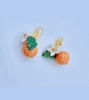 Picture of Orange earrings with white flower and leaf