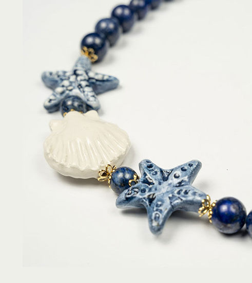 Picture of Lapis lazuli necklace with blue star and white shell