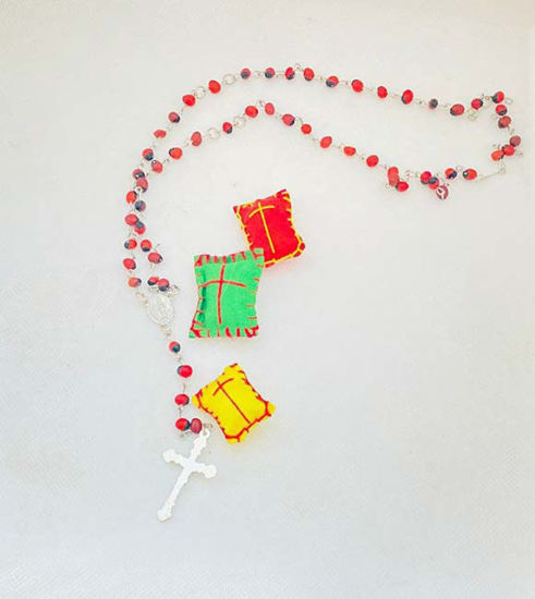 Picture of Huayruro Rosary and Free Lucky Amulets.