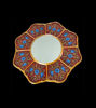 Decorative mirror featuring a red and blue floral design, handcrafted in Peru with a silver leaf finish, reflecting Cuzco style.