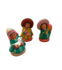 Ceramic nativity scene featuring handcrafted Mexican figures adorned with folk art-inspired designs and details.