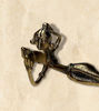 Picture of “Whispers of Knowledge” Dhokra Art Brass Figurine: Woman Engrossed in a Book