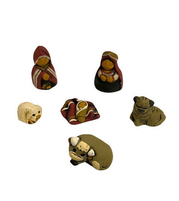 A group of 7 tiny handmade nativity figurines, crafted from clay and hand-painted, showcasing a Peruvian Holy Family scene.
