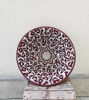 Intricately designed burgundy ceramic washbasin, handcrafted in Morocco, combining mid-century modern charm with artistic flair.