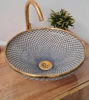 A handmade Fez Blue ceramic sink with a gold faucet and fish scale design, showcasing Moroccan craftsmanship and elegance.