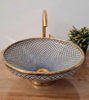 Unique Fez Blue ceramic sink with a brass rim and fish scale design, highlighting Moroccan artistry and modern farmhouse style.