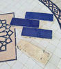 Elegant blue tile floor featuring handmade Zellige terracotta tiles, ideal for adding Moroccan charm to any space.