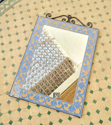 Show details for Light Blue Moroccan Mosaic Wall Mirror | Handmade Customizable Mirror for Wall or Floor | Indoor & Outdoor Tile Mirror Light blue Moroccan mosaic mirror on a tiled floor, showcasing intricate geometric patterns and handcrafted artistry.