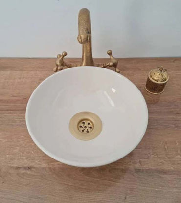 Show details for Minimalist Hand-Painted Ceramic Vessel Sink | Moroccan Handmade Washbasin Bowl | Modern Bathroom Countertop Basin A white ceramic vessel sink with a gold faucet, showcasing minimalist hand-painted design, perfect for modern bathrooms.