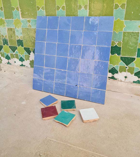 Handmade blue and cornflower zellige tile panel, featuring 36 square tiles in a vibrant 12x12 inch mosaic design.