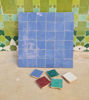 12x12 inch mosaic panel of 36 handmade tiles in royal blue and cornflower, showcasing Moroccan craftsmanship and color.