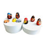 A set of 8 handmade Peruvian nativity scene figurines on a white box, each 1.5 inches, showcasing intricate hand-painted details.