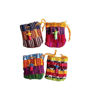 Colourful handmade worry dolls, each about one inch tall, representing Guatemalan folk traditions.