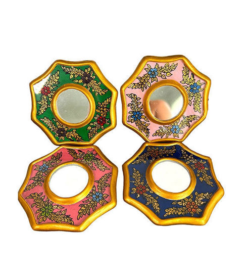 A set of handmade decorative mirrors featuring intricate gold and blue designs, showcasing Peruvian Colonial artistry.