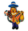 A 9-inch handmade Ekeko doll, a Peruvian figurine of a man with a guitar, symbolizing abundance and good fortune.
