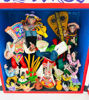 A colorful retablo featuring hand-painted figurines of people and animals, showcasing Peruvian holiday festivities and dances.