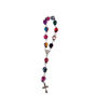 Colorful handmade Peruvian rosary featuring a cross and vibrant beads, set against a white background, celebrating tradition.