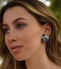 Picture of Bouquet clip earrings with little blue ceramic flowers, pearls and stones