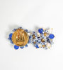 Picture of Bouquet clip earrings with little blue ceramic flowers, pearls and stones