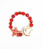 Picture of Bracelet with star and shell in ceramic, with pearls of Agate and Cornelian stones