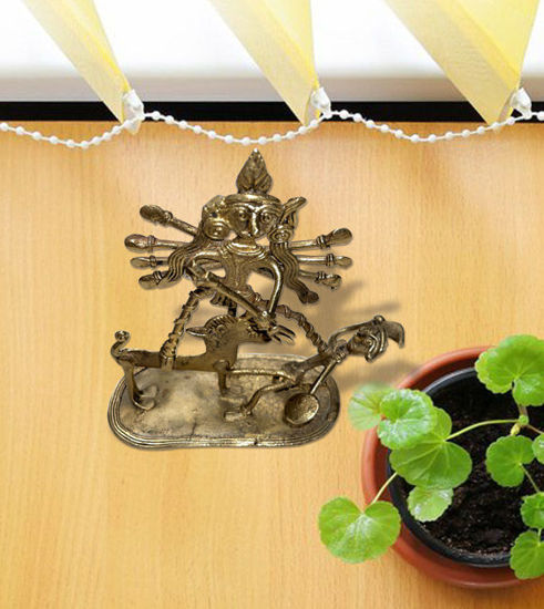 Handcrafted brass durga figurine, showcasing intricate detailing and traditional Dhokra craftsmanship.