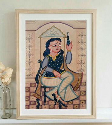 Framed Bengal Patachitra painting of a man seated gracefully, holding a decorative object against a patterned backdrop.