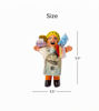 Ekeko doll, crafted in Peru, features money and candy, representing prosperity and blessings from Andean mythology.