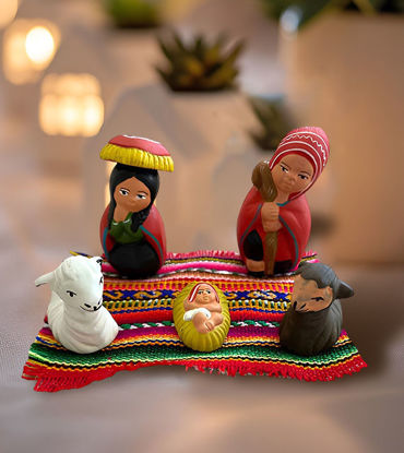 A handmade Mexican-style nativity scene, featuring the Holy Family, crafted by Peruvian artisans with natural paints.