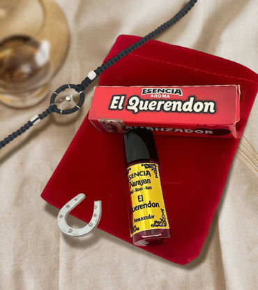 Show details for El Querendon Spiritual Oil – Handmade Attraction & Love Perfume | Herbal Ritual Oil for Positive Energy & Intention A bottle of El Querendon spiritual oil beside a horseshoe, symbolizing love, protection, and positive energy.