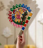 Hand-painted wooden fan featuring vibrant Bengal Pattachitra art, showcasing intricate folk motifs and a sturdy handle.