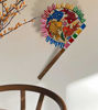 Vibrant wooden fan adorned with fish motifs, representing Bengal Pattachitra art, ideal for cultural displays and decor.