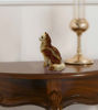 Jeweled cat trinket box figurine with crystal accents, sitting on a white surface, showcasing a vintage luxury design.